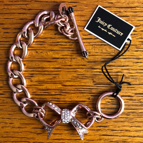 Juicy Couture Jewelry - NWT Juicy Couture Rose Gold Link Bow Bracelet